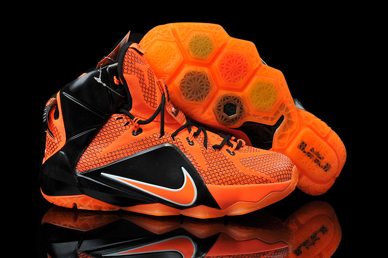 orange and black nike tennis shoes